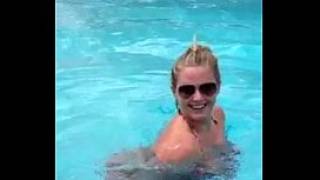 Blowjob in public pool by blonde recorded on mobile phone