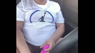 Freak gets caught in parking lot fucking her pussy in car
